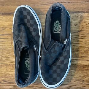 Vans black checkerboard slip ons